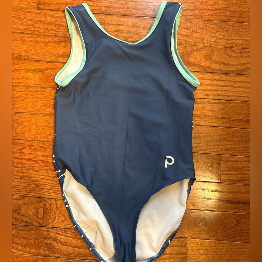 Plum child large gymnastics Leo with fun design on the back!